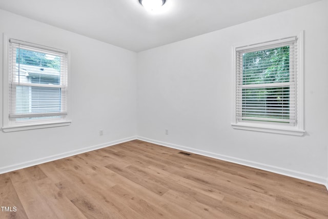 1804 Charles St, Raleigh, NC 27610 - spare room with light wood-type flooring and baseboards