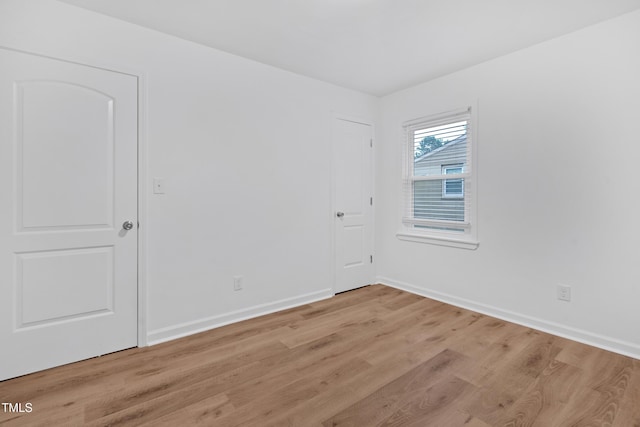 1804 Charles St, Raleigh, NC 27610 - spare room with light wood-style flooring and baseboards