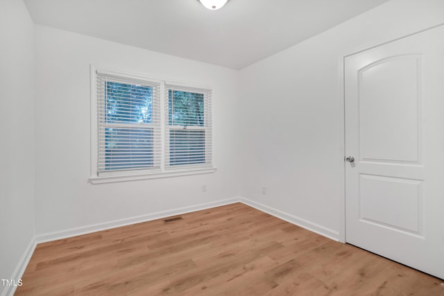 1804 Charles St, Raleigh, NC 27610 - empty room featuring light wood-style floors and baseboards