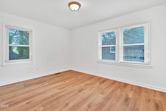 1804 Charles St, Raleigh, NC 27610 - spare room with light wood-style flooring and baseboards