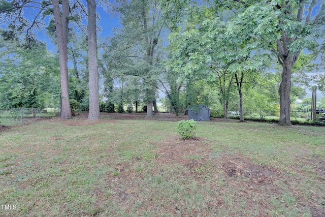 1804 Charles St, Raleigh, NC 27610 - view of yard featuring a shed