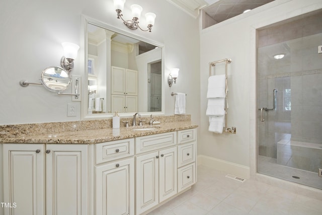 4137 Gardenlake Dr, Raleigh, NC 27612 - full bath with a stall shower, vanity, tile patterned flooring, and crown molding