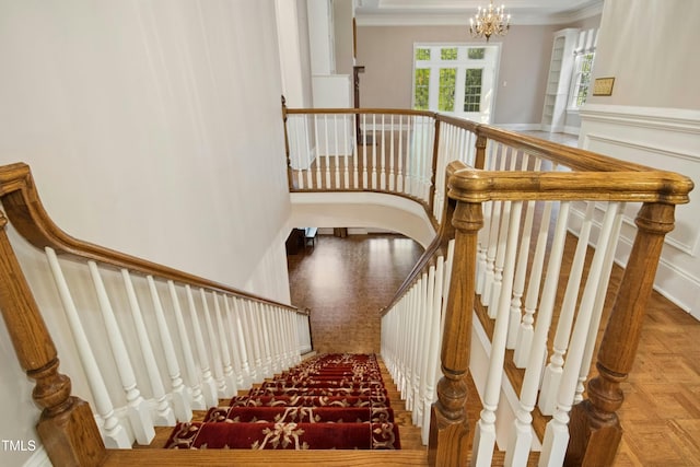4137 Gardenlake Dr, Raleigh, NC 27612 - stairway with a chandelier and crown molding