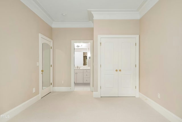 4137 Gardenlake Dr, Raleigh, NC 27612 - unfurnished bedroom with ornamental molding, light colored carpet, a closet, and connected bathroom