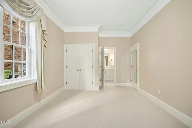 4137 Gardenlake Dr, Raleigh, NC 27612 - unfurnished bedroom with crown molding, carpet, a closet, and ensuite bath