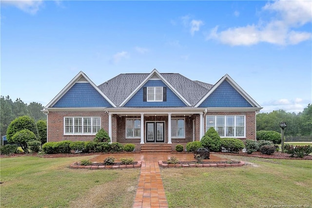 9871 Ramsey St, Linden, NC 28356 - craftsman-style house featuring brick siding and a front lawn