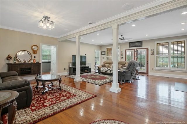 9871 Ramsey St, Linden, NC 28356 - living room featuring ornate columns, hardwood / wood-style flooring, crown molding, recessed lighting, and a ceiling fan
