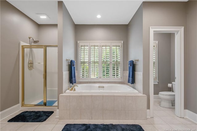 9871 Ramsey St, Linden, NC 28356 - bathroom with tile patterned floors, a garden tub, and a stall shower