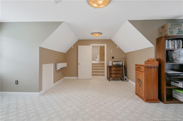 9871 Ramsey St, Linden, NC 28356 - additional living space with heating unit, light carpet, and vaulted ceiling
