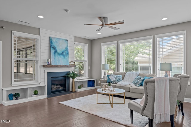 113 Willow View Ln, Apex, NC 27539 - living area with a ceiling fan, wood finished floors, a fireplace with flush hearth, and recessed lighting