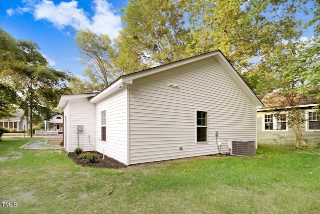 1307 S 14th St, Lillington, NC 27546 - view of side of home with a lawn
