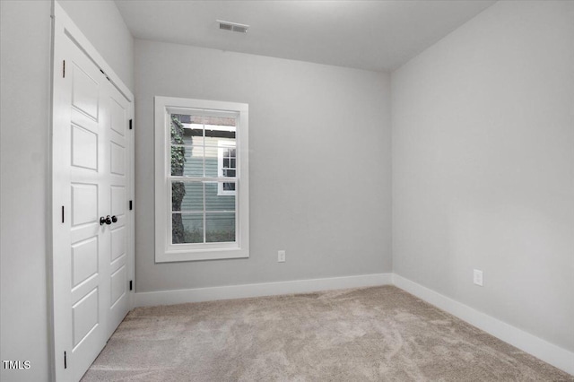 1307 S 14th St, Lillington, NC 27546 - empty room with carpet flooring and baseboards
