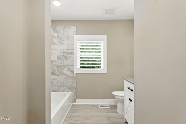 7722 NC-27, Lillington, NC 27546 - full bathroom featuring vanity and wood finished floors