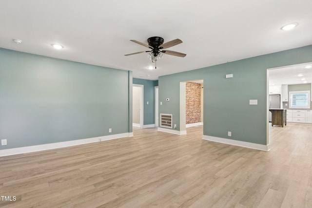 7722 NC-27, Lillington, NC 27546 - empty room with a ceiling fan, light wood-style floors, recessed lighting, and a smoke detector
