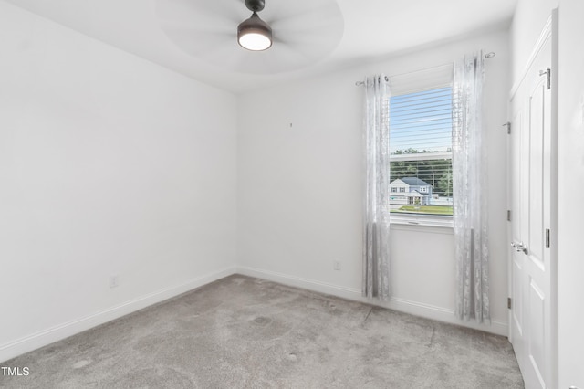 6109 Oak Passage Dr, Raleigh, NC 27603 - carpeted empty room featuring ceiling fan and baseboards