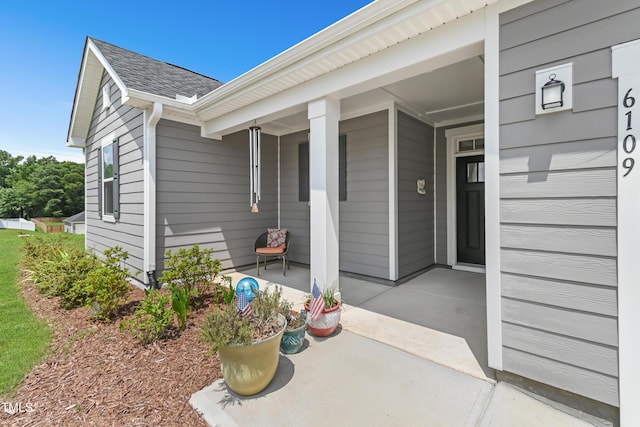 6109 Oak Passage Dr, Raleigh, NC 27603 - entrance to property with covered porch and roof with shingles