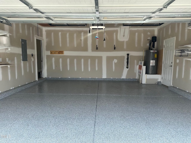 6109 Oak Passage Dr, Raleigh, NC 27603 - garage featuring water heater and electric panel