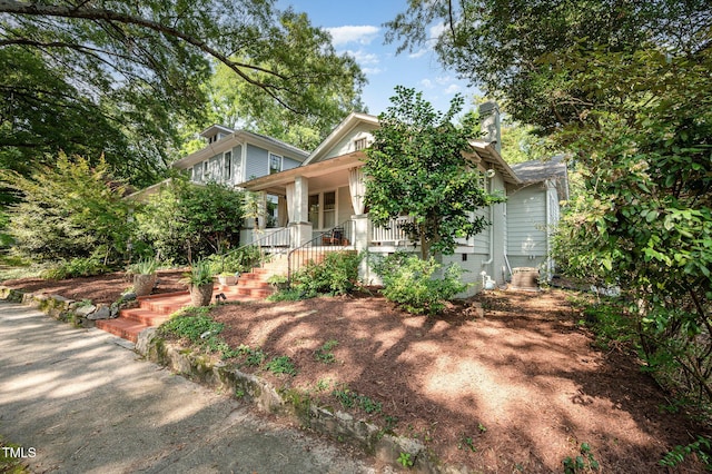 513 Cutler St, Raleigh, NC 27603 - view of front of property with a porch and stairway