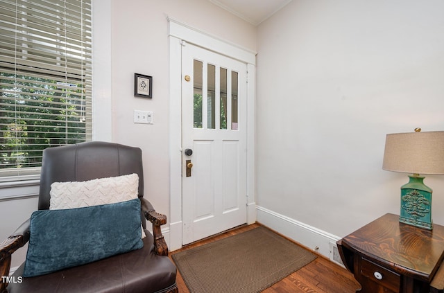 513 Cutler St, Raleigh, NC 27603 - foyer featuring wood finished floors and ornamental molding