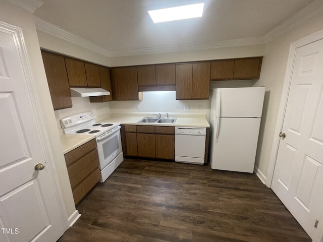 3603 Helix Ct Unit 102, Raleigh, NC 27606 - kitchen featuring white appliances, under cabinet range hood, light countertops, crown molding, and dark wood finished floors