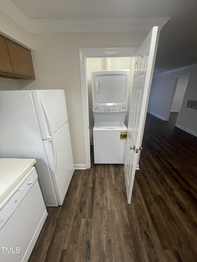 3603 Helix Ct Unit 102, Raleigh, NC 27606 - laundry room featuring stacked washer and clothes dryer and dark wood-style flooring