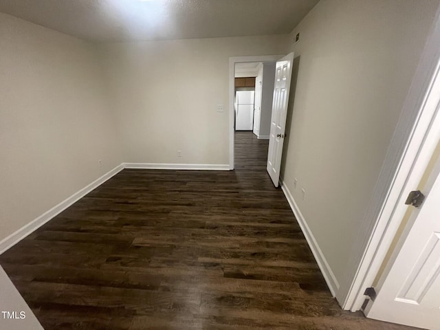 3603 Helix Ct Unit 102, Raleigh, NC 27606 - empty room featuring dark wood-type flooring and baseboards