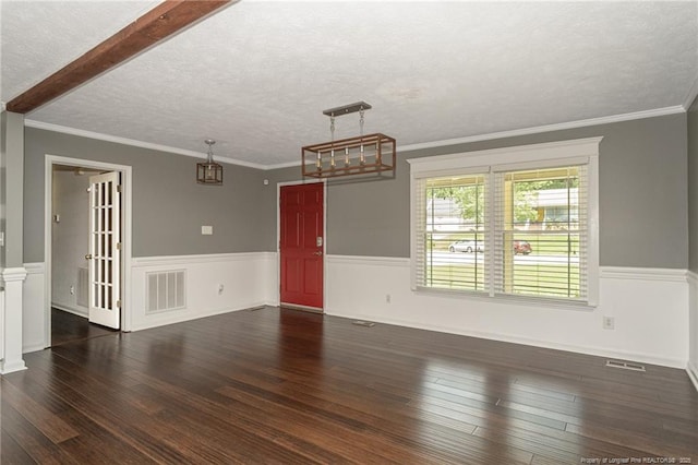 5621 Monks Walk Ct, Fayetteville, NC 28311 - spare room featuring wood finished floors, a textured ceiling, a wainscoted wall, and crown molding