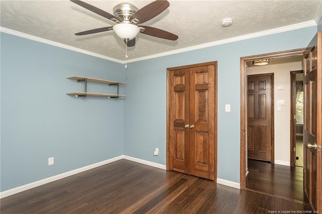 5621 Monks Walk Ct, Fayetteville, NC 28311 - unfurnished bedroom with dark wood-type flooring, a textured ceiling, crown molding, and a ceiling fan