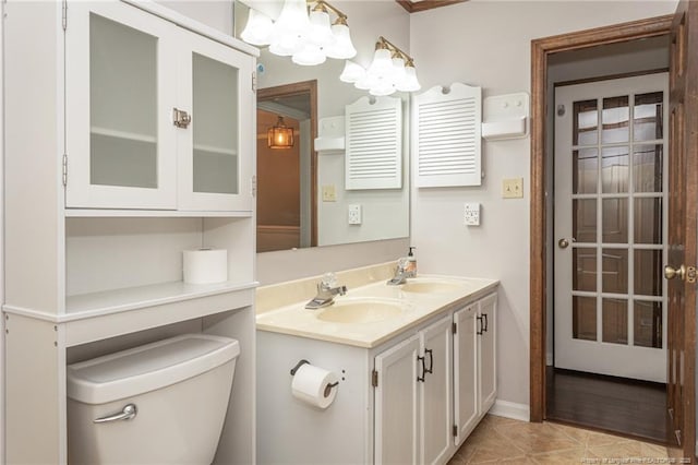 5621 Monks Walk Ct, Fayetteville, NC 28311 - bathroom with double vanity, tile patterned floors, and a chandelier