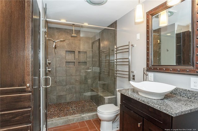 5621 Monks Walk Ct, Fayetteville, NC 28311 - bathroom featuring a stall shower, vanity, and a towel warmer
