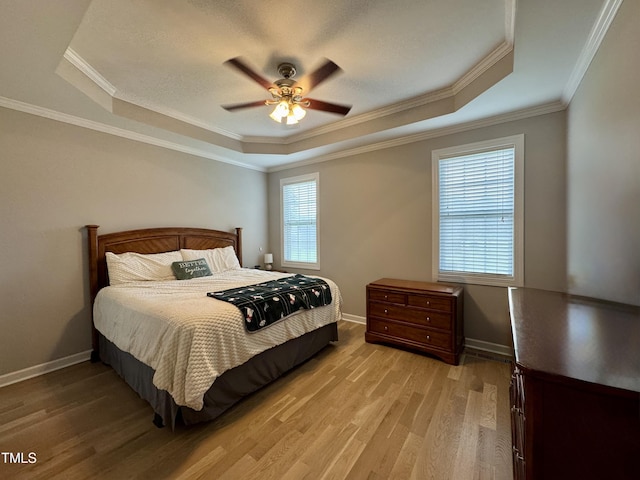 71 Beaver Creek Dr, Dunn, NC 28334 - bedroom featuring a raised ceiling, wood finished floors, crown molding, and ceiling fan