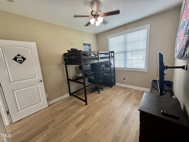 71 Beaver Creek Dr, Dunn, NC 28334 - bedroom with light wood finished floors, a desk, and ceiling fan