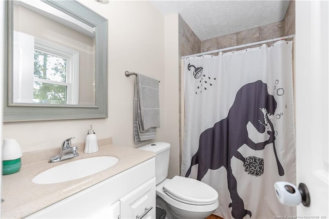1524 Stackhouse Dr, Fayetteville, NC 28314 - bathroom with vanity, a textured ceiling, and a shower with curtain