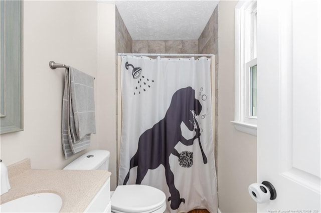 1524 Stackhouse Dr, Fayetteville, NC 28314 - bathroom with vanity, a shower with curtain, and a textured ceiling