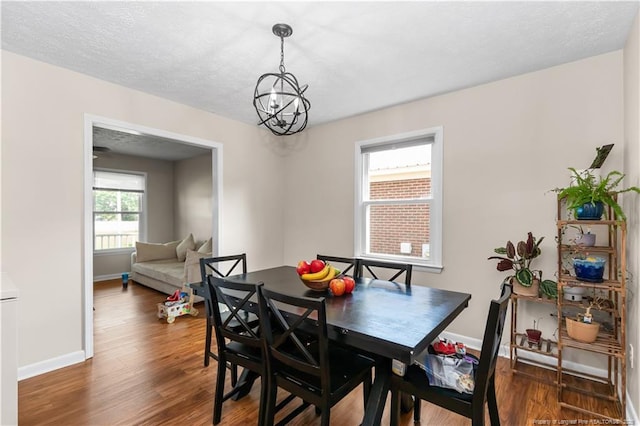 1524 Stackhouse Dr, Fayetteville, NC 28314 - dining room featuring a chandelier and wood finished floors