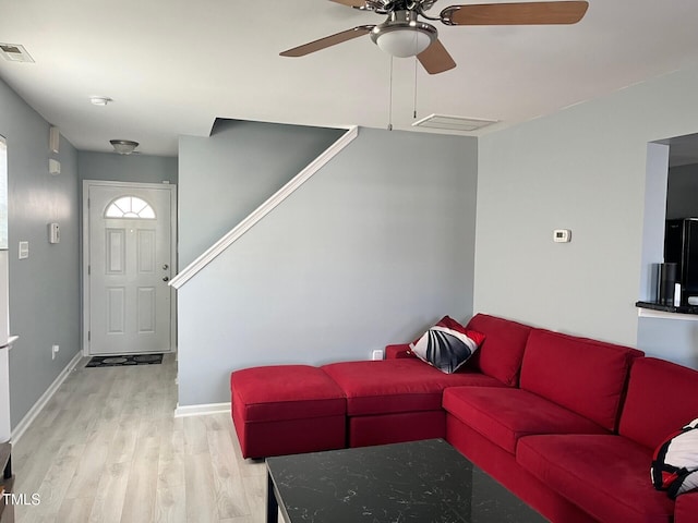 8836 Thornton Garden Ln, Raleigh, NC 27616 - living area with ceiling fan and light wood finished floors