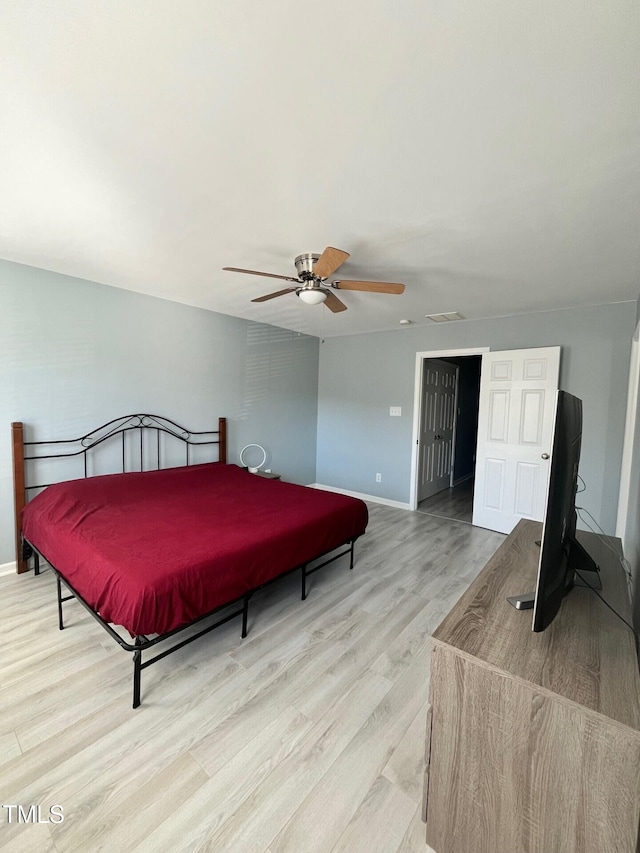 8836 Thornton Garden Ln, Raleigh, NC 27616 - bedroom with light wood-type flooring and ceiling fan