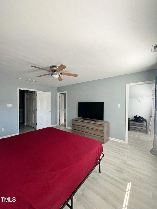 8836 Thornton Garden Ln, Raleigh, NC 27616 - bedroom with light wood-style flooring and ceiling fan
