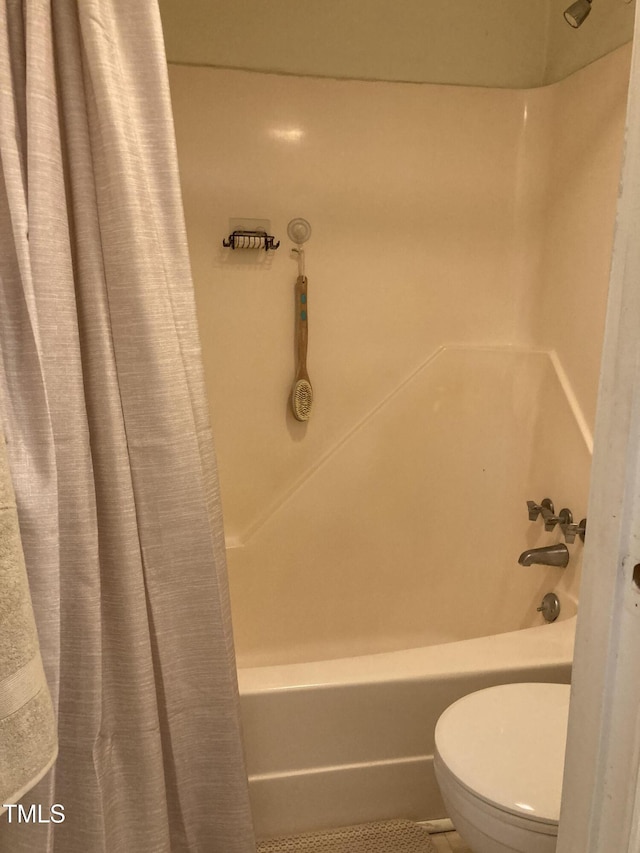500 Umstead Dr Unit D307, Chapel Hill, NC 27516 - bathroom featuring shower / bath combo with shower curtain and tile patterned floors