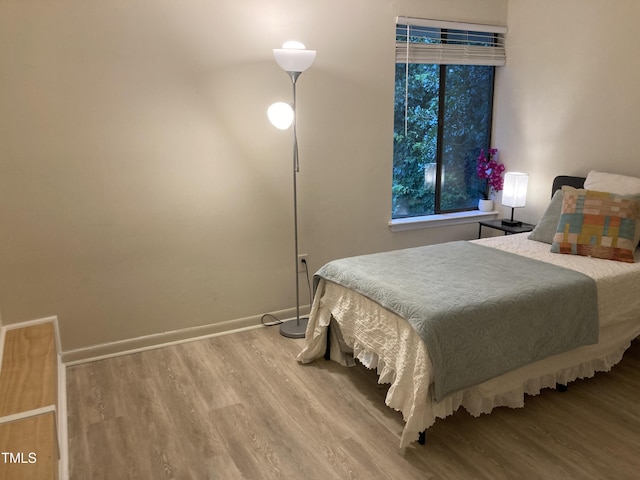 500 Umstead Dr Unit D307, Chapel Hill, NC 27516 - bedroom with wood finished floors and baseboards