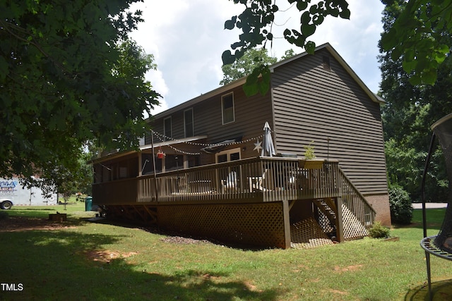 9 Pinecourt Dr, Siler City, NC 27344 - back of house with a deck, a lawn, and stairway