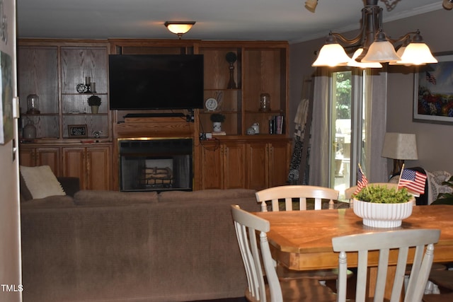 9 Pinecourt Dr, Siler City, NC 27344 - dining area featuring crown molding and a chandelier