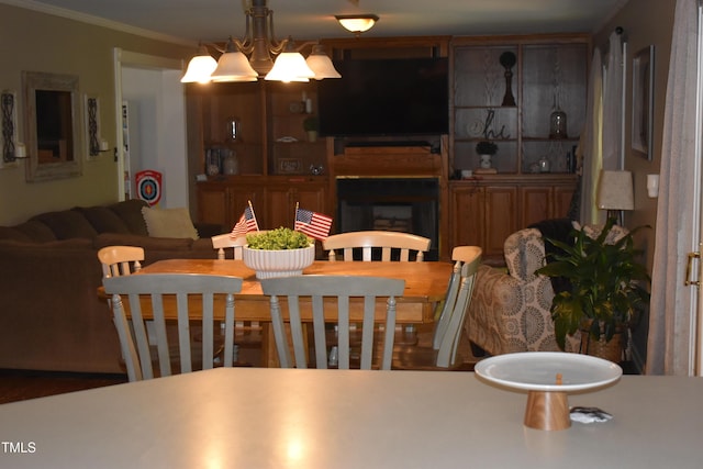 9 Pinecourt Dr, Siler City, NC 27344 - dining room featuring ornamental molding and a fireplace