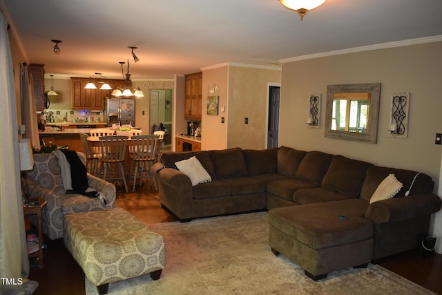 9 Pinecourt Dr, Siler City, NC 27344 - living area with ornamental molding and wood finished floors