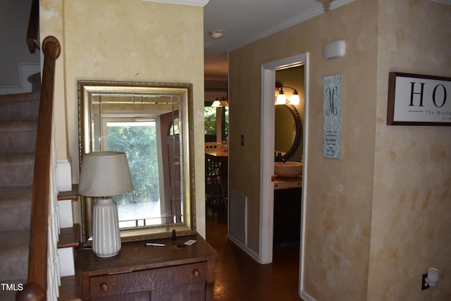 9 Pinecourt Dr, Siler City, NC 27344 - foyer featuring stairway, ornamental molding, and dark wood-type flooring