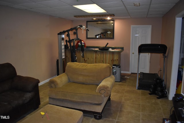 9 Pinecourt Dr, Siler City, NC 27344 - tiled living area featuring a paneled ceiling and baseboards