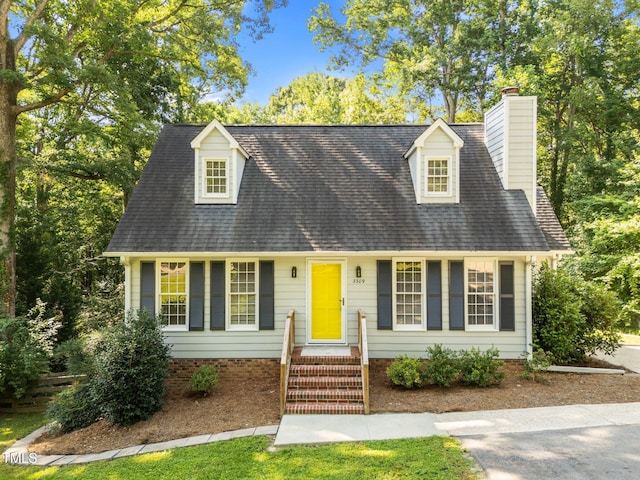 3309 Bearskin Ct, Raleigh, NC 27606 - cape cod home with a chimney and roof with shingles