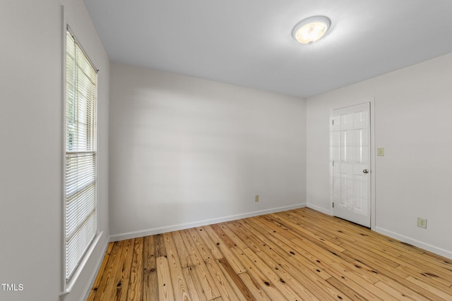 3309 Bearskin Ct, Raleigh, NC 27606 - unfurnished room with hardwood / wood-style flooring and baseboards