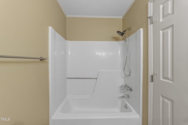 3309 Bearskin Ct, Raleigh, NC 27606 - bathroom featuring ornamental molding and washtub / shower combination