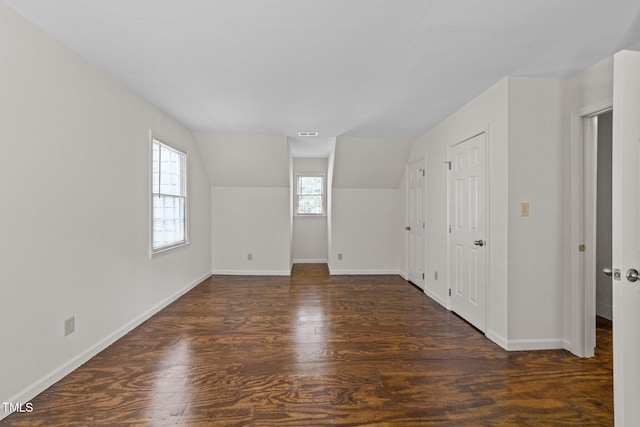 3309 Bearskin Ct, Raleigh, NC 27606 - interior space featuring wood finished floors and vaulted ceiling
